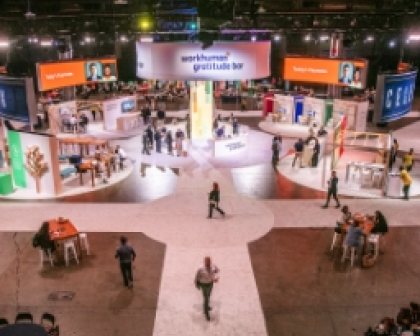 A bustling Workhuman event space featuring the 
