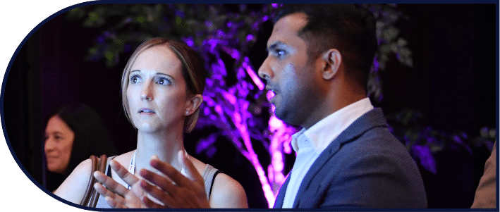 Attendees looking over to the side